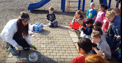 Alyana SCS Student volunteering with children