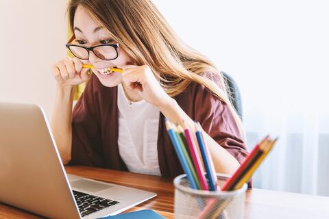 woman studying on computer