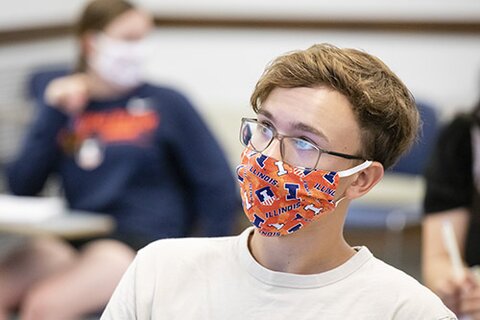 student with mask on in class