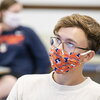 student with mask on in class