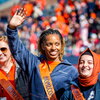 The Homecoming court enjoys the moment during a football halftime show at Memorial Stadium.