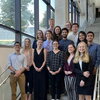 REU students with a group picture on a staircase