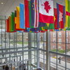 Ceiling flags hanging over the atrium area of the northeast entrance to the SDRP building.