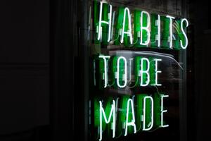 habits to be made in neon sign