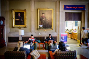 Students studying at The University of Illinois Main Library