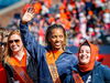 The Homecoming court enjoys the moment during a football halftime show at Memorial Stadium.