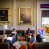 Students studying at The University of Illinois Main Library